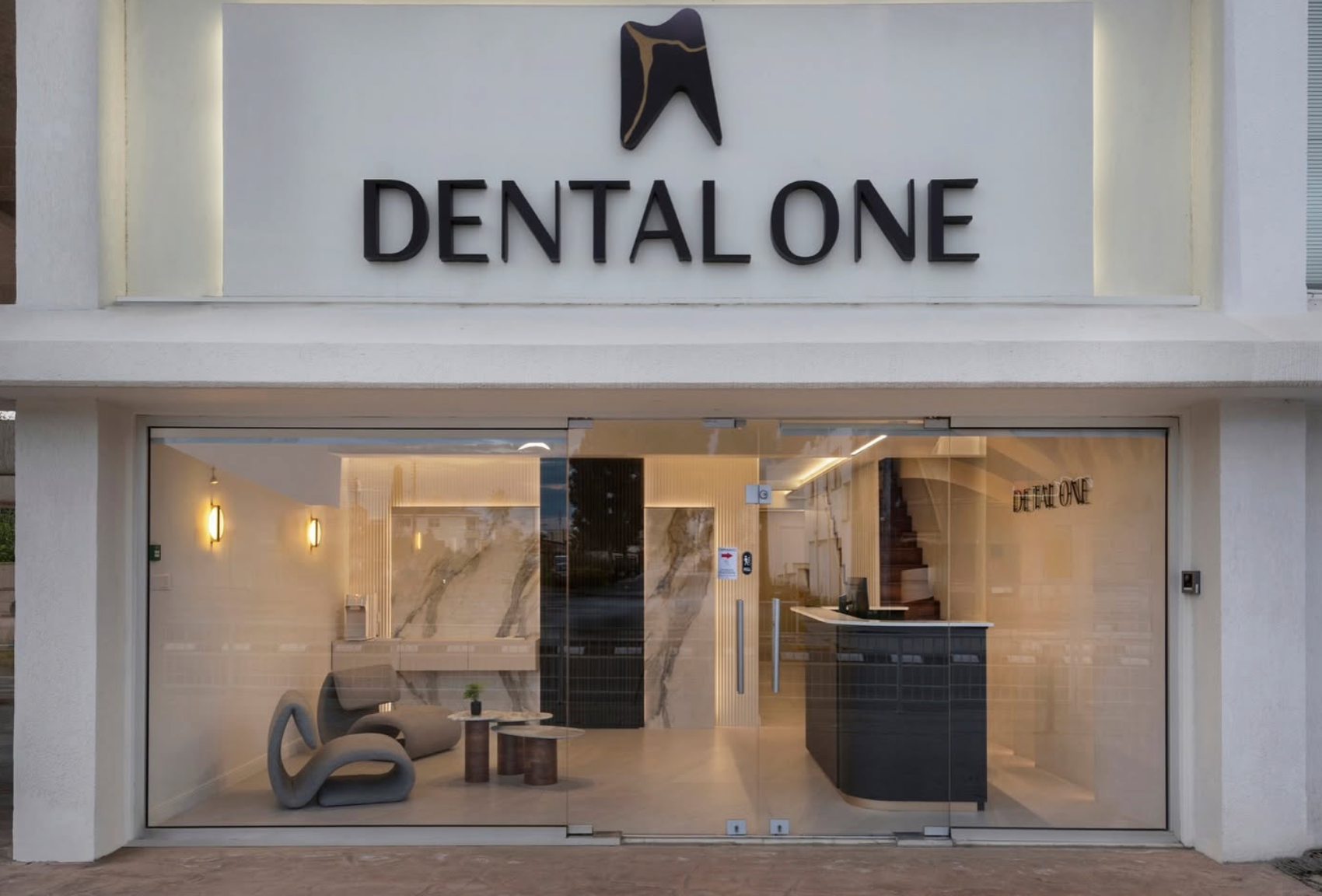 Exterior entrance and Dental One sign in Lakatamia